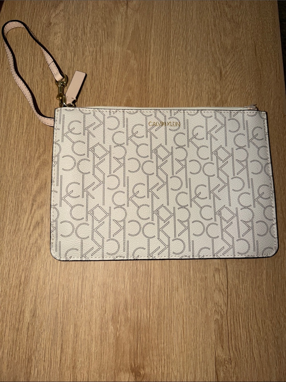 Calvin Klein Cream Monogram Wristlet Pouch